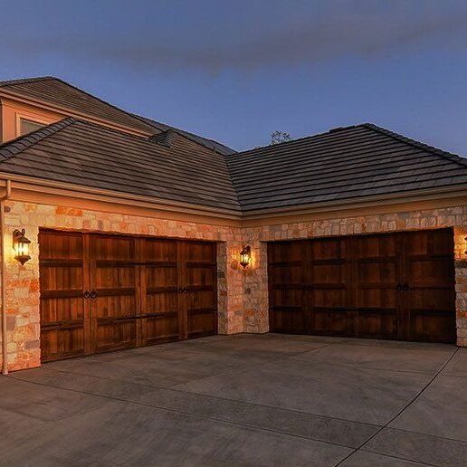 A Westminster home with garage doors serviced by Cal Pacific
